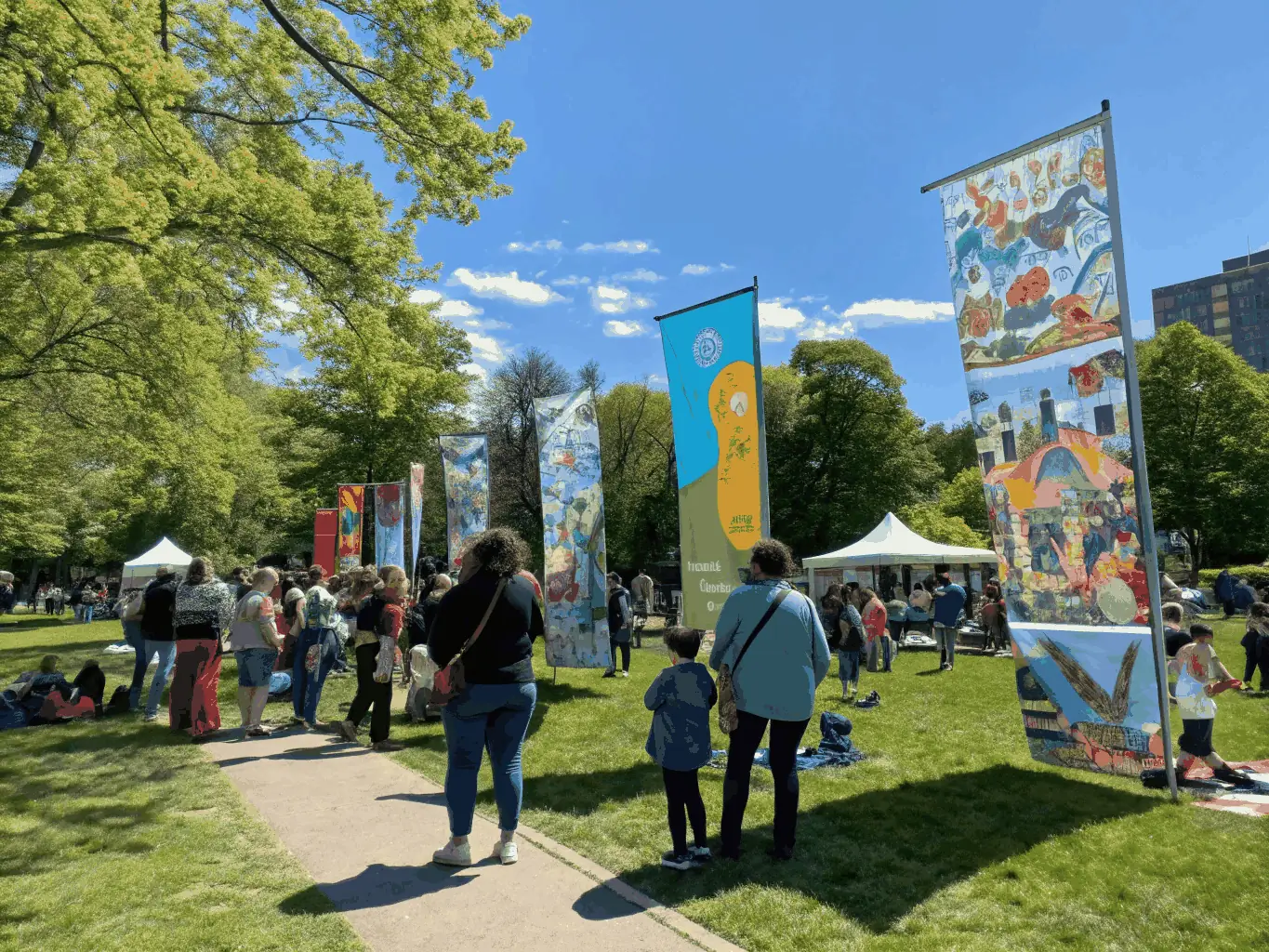 A dynamic image of a community cultural event, featuring live music, art installations, and diverse attendees interacting and enjoying the festivities.
